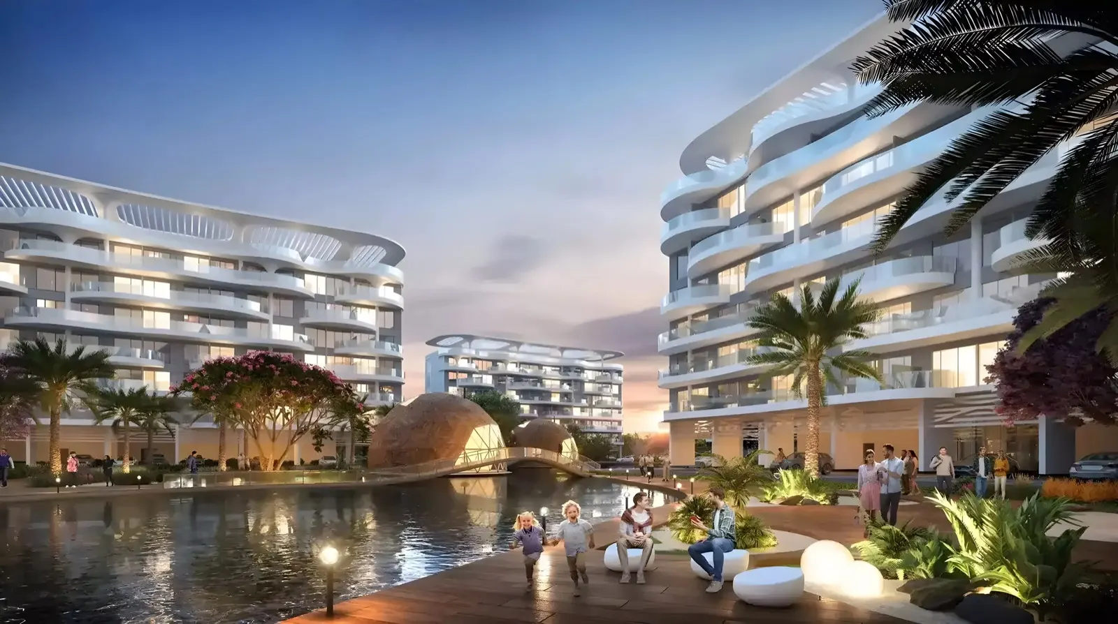 Sorrento at DAMAC Lagoons — mid-rise lagoon-front apartment buildings with curved balconies at dusk